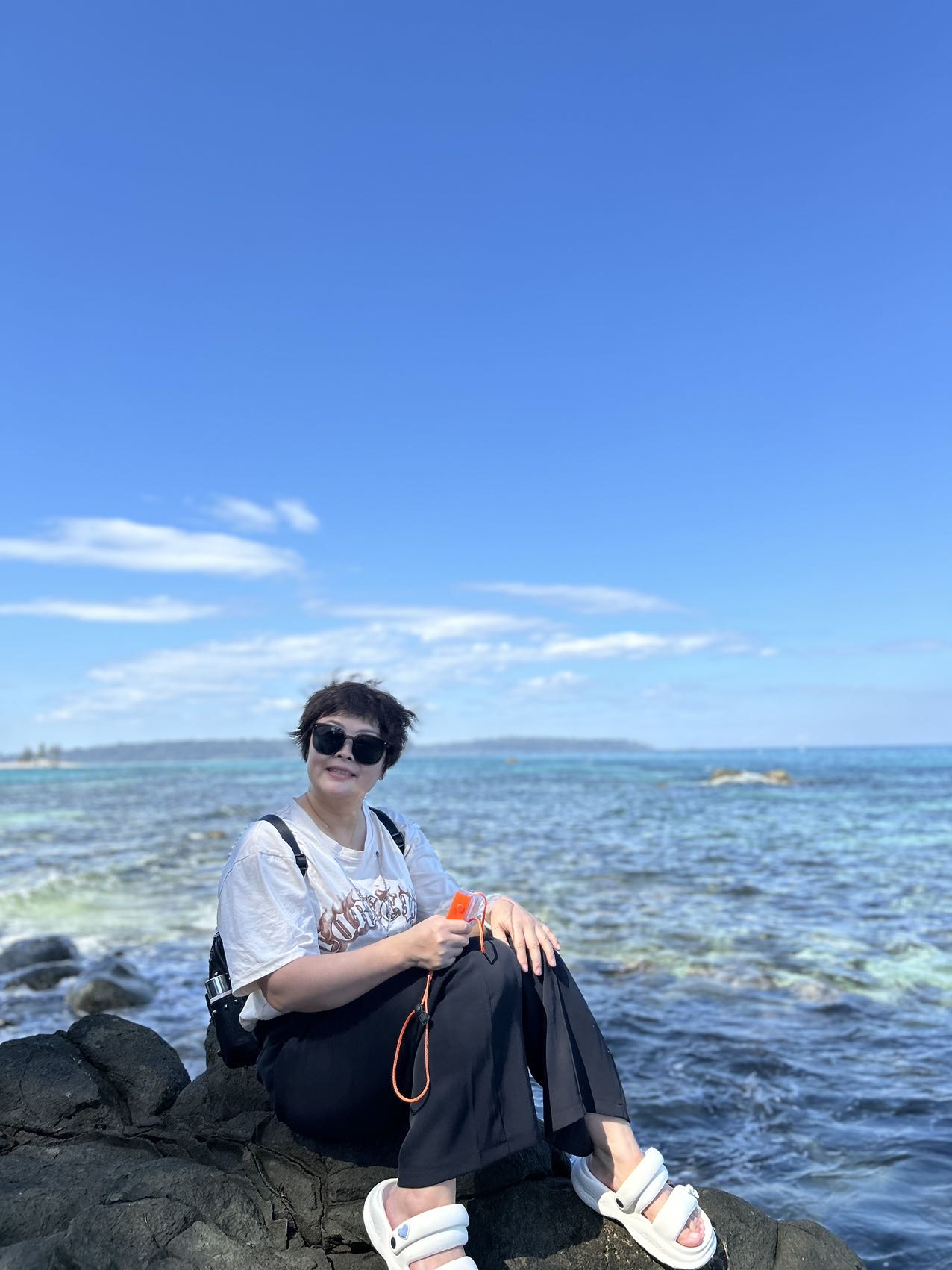 梁女士